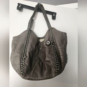 The Sak leather grey purse with hardware